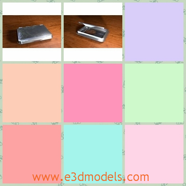 3d model a tobacco tin made in metal - This is a 3d model of a tobacco tin made id metal materials,which is shining and is a oblong shape.The model has some piles of tobacco in it.