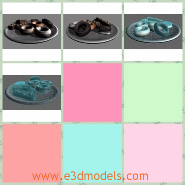3d model of pastry snacks on plate - This 3d model is about some pastry snacks on a round plate. On the plate we can see small biscuits and a piece of cake.
